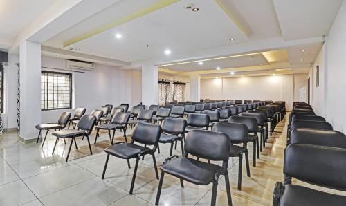 a room with rows of chairs in a room at Treebo Symphony Hotels And Resorts Angamally in Kizhake Chālakudi