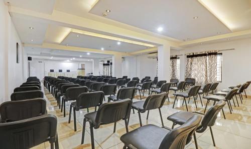 a room with rows of chairs in a hall at Treebo Symphony Hotels And Resorts Angamally in Kizhake Chālakudi