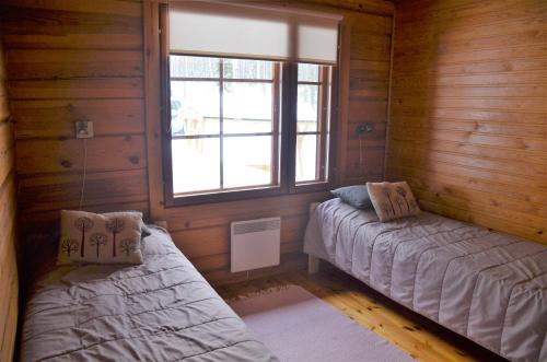 En eller flere senge i et værelse på Turjanlinna