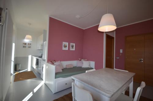 Posteľ alebo postele v izbe v ubytovaní Varennahouse Lory Apt