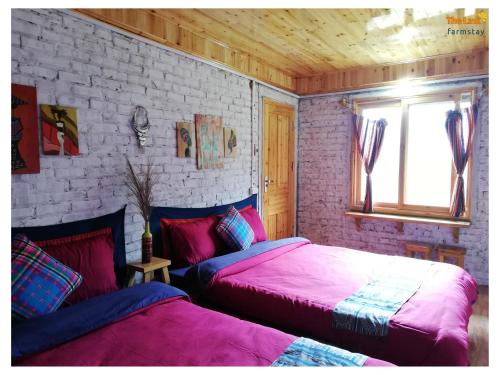 Ένα ή περισσότερα κρεβάτια σε δωμάτιο στο The Link farmstay