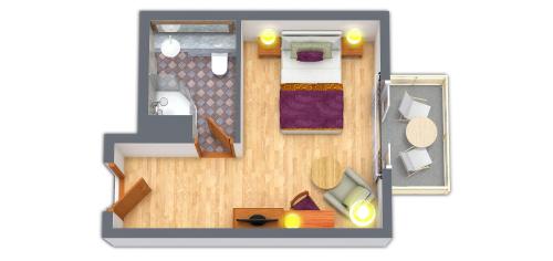 a floor plan of a room with a bedroom at A-ROSA Strandidyll Heringsdorf in Heringsdorf