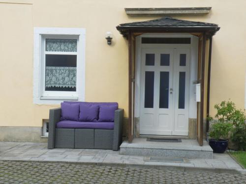 Posezení v ubytování Ferienwohnung Am Lindenbaum