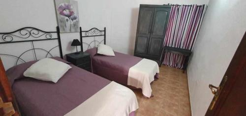 Säng eller sängar i ett rum på Villa Rural Casa Jorsam UNIFAMILIAR