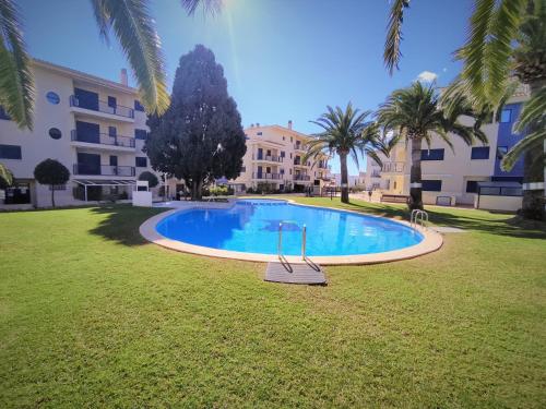 Bajo con terraza, parking y piscina en el centro PORTA MEDITERRANEA ALBERT VILLAS