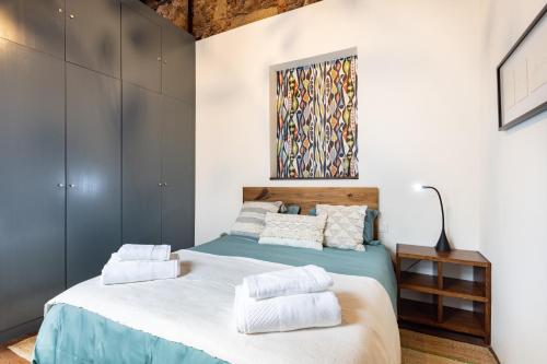 Postel nebo postele na pokoji v ubytování Home2Book Stylish Design House in La Laguna Center