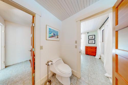 a bathroom with a toilet in a room at The Lemonade Stand in West Tisbury