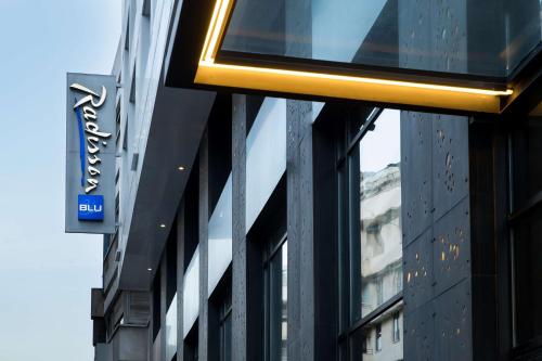 a sign on the side of a building at Radisson Blu Hotel Casablanca City Center in Casablanca