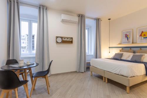 Posteľ alebo postele v izbe v ubytovaní Cool and stylish city apartment - WiFi