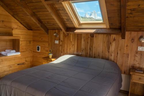 Una cama o camas en una habitación de Campo Base Aparts