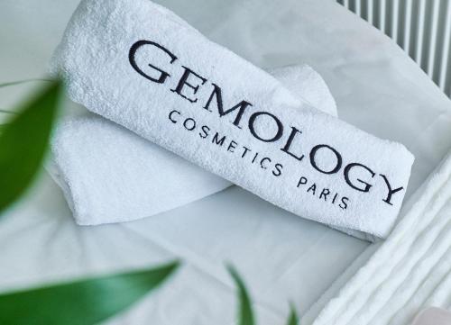 a white napkin with the word gordonoco constitutes parties at Grand Baltic Dunes Hotel & SPA in Palanga