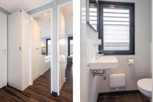 Kúpeľňa v ubytovaní Houseboat 'Elysium' met eigen aanlegsteiger Sneek - Offingawier