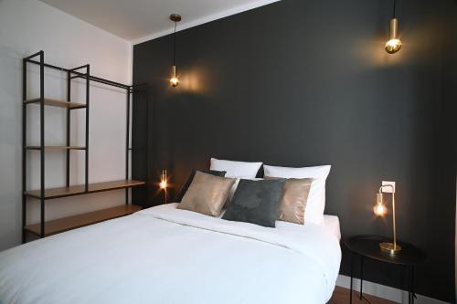 Llit o llits en una habitació de Sognu di Matteu - Bel appartement entièrement climatisé - vue mer, vieux port Bastia