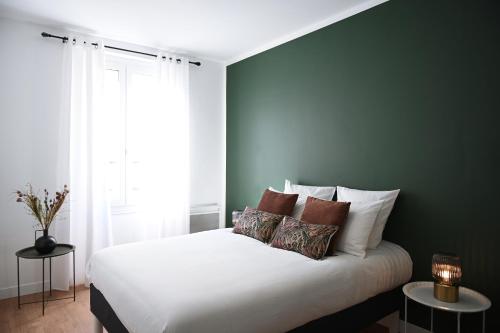Sognu di Matteu - Bel appartement entièrement climatisé - vue mer, vieux port Bastiaにあるベッド