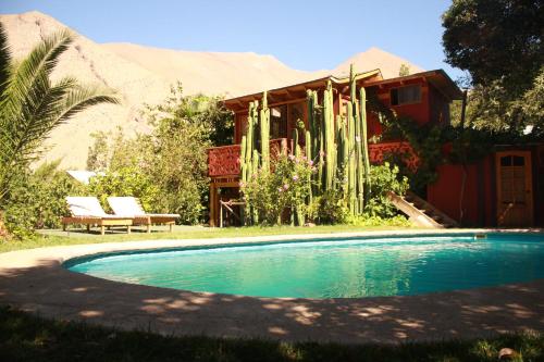 Bazén v ubytovaní El Jardín Secreto-Pisco Elqui alebo v jeho blízkosti
