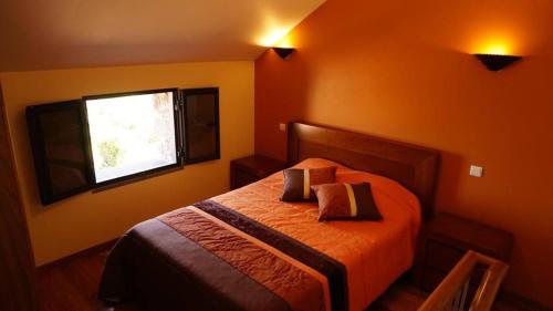 Katil atau katil-katil dalam bilik di Recantos do Castanheiro