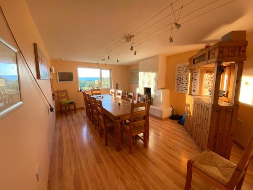 a dining room with a table and chairs at Connemara Haven Bed and Breakfast in Oughterard