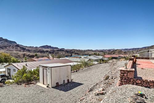 a house with a shed on the side of a road at Sun-Dappled AZ Abode with River and Mtn Views! in Parker