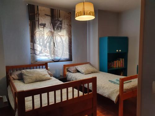 Cama ou camas em um quarto em Casa rural en la Sierra Norte de Madrid