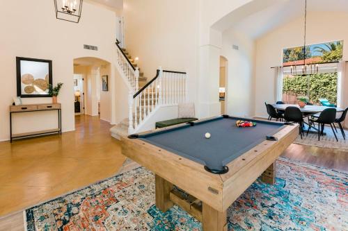 a pool table in the middle of a living room at Habanero Hideaway in Oro Valley
