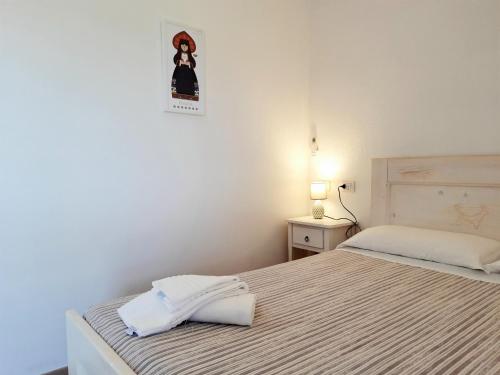 Ένα ή περισσότερα κρεβάτια σε δωμάτιο στο Agriturismo Orvile