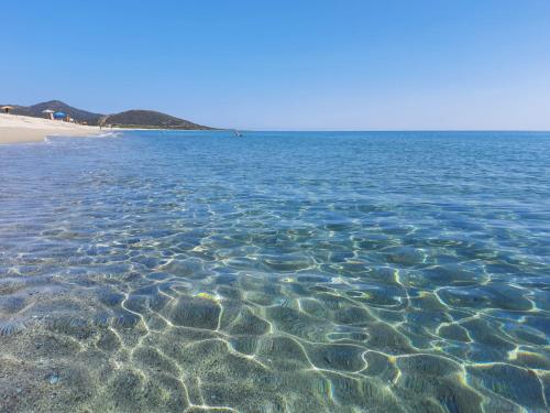 a view of the water at a beach at Agriturismo Orvile in Posada
