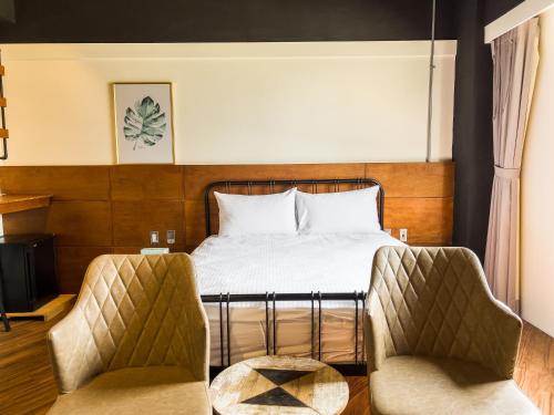Posteľ alebo postele v izbe v ubytovaní Tra旅宿