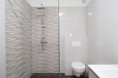 Kúpeľňa v ubytovaní Arena apartment with 3 bedrooms in the city center