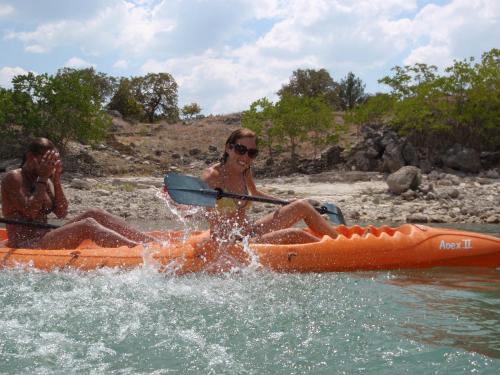 two people sitting on a raft in the water at Canyon Lakeview Resort in Canyon Lake