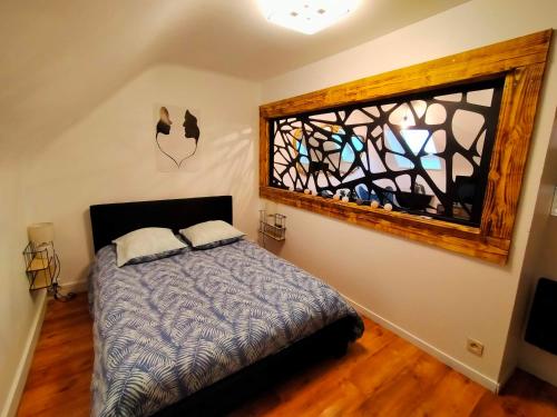 Postel nebo postele na pokoji v ubytování ConcarnOLoc