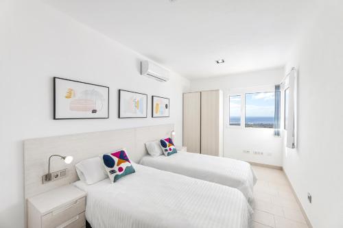 Ένα ή περισσότερα κρεβάτια σε δωμάτιο στο Suite Isabela