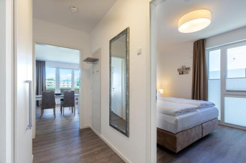 Postel nebo postele na pokoji v ubytování Aparthotel Ostseeallee Aparthotel Ostseeallee 2-15