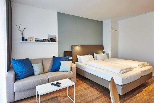 Postel nebo postele na pokoji v ubytování Deichhäuser Anna Küste Deichhäuser Anna Küste 3-22