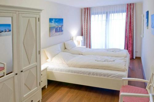 Postel nebo postele na pokoji v ubytování Urlaubsräume am Meer Urlaubsräume am Meer 1-17