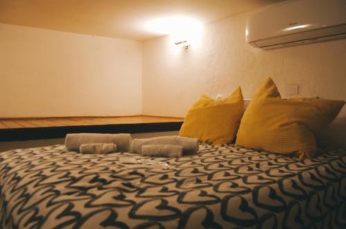Voodi või voodid majutusasutuse Il Soppalco toas