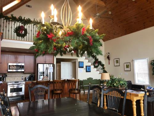 a kitchen with a christmas wreath hanging above a table at Lake views galore from balconies right on the lake and drought-proof deep water in Murrayville