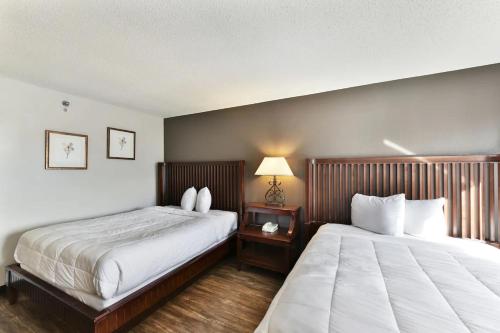 En eller flere senger på et rom på Baymont Inn and Suites by Wyndham Columbus / Near OSU