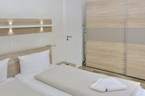 Postel nebo postele na pokoji v ubytování Resort Deichgraf Resort Deichgraf 27-14