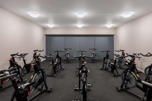 a room with a bunch of bikes in a gym at Radisson Blu Hotel London Stansted Airport in Stansted Mountfitchet