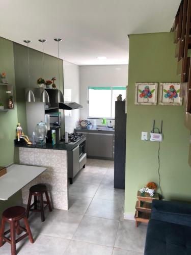 Kuchyň nebo kuchyňský kout v ubytování Penhasco Residences