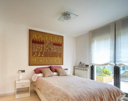 Ένα ή περισσότερα κρεβάτια σε δωμάτιο στο HomeSweetViews Anyós