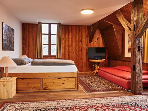 Giường trong phòng chung tại Ferienhaus Oliver im Wendorf Bernstein Resort