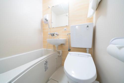 Een badkamer bij KOKO HOTEL Kagoshima Tenmonkan