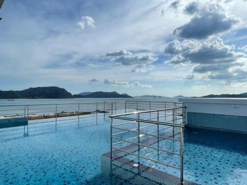 a view of the water on a cruise ship at Simfoni Beliza Apartment with Roof Top Pool by Vintage in Kuah