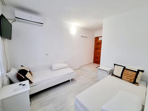 Postel nebo postele na pokoji v ubytování Motel Thessaloniki