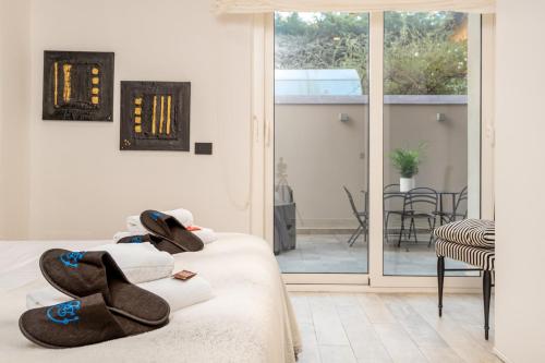 Postel nebo postele na pokoji v ubytování Appartamento Guido