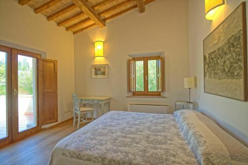 A bed or beds in a room at Villa Panizzi by PosarelliVillas