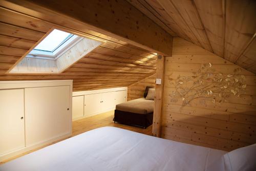 Кровать или кровати в номере Gîte La Perhotte
