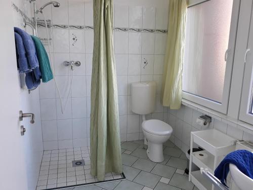 Ванна кімната в Seevilla Wietjes Whg 4