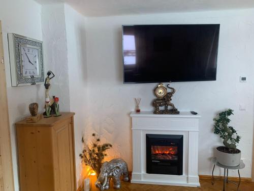 A television and/or entertainment centre at Holiday Home Muhr near Katschberg Ski Area